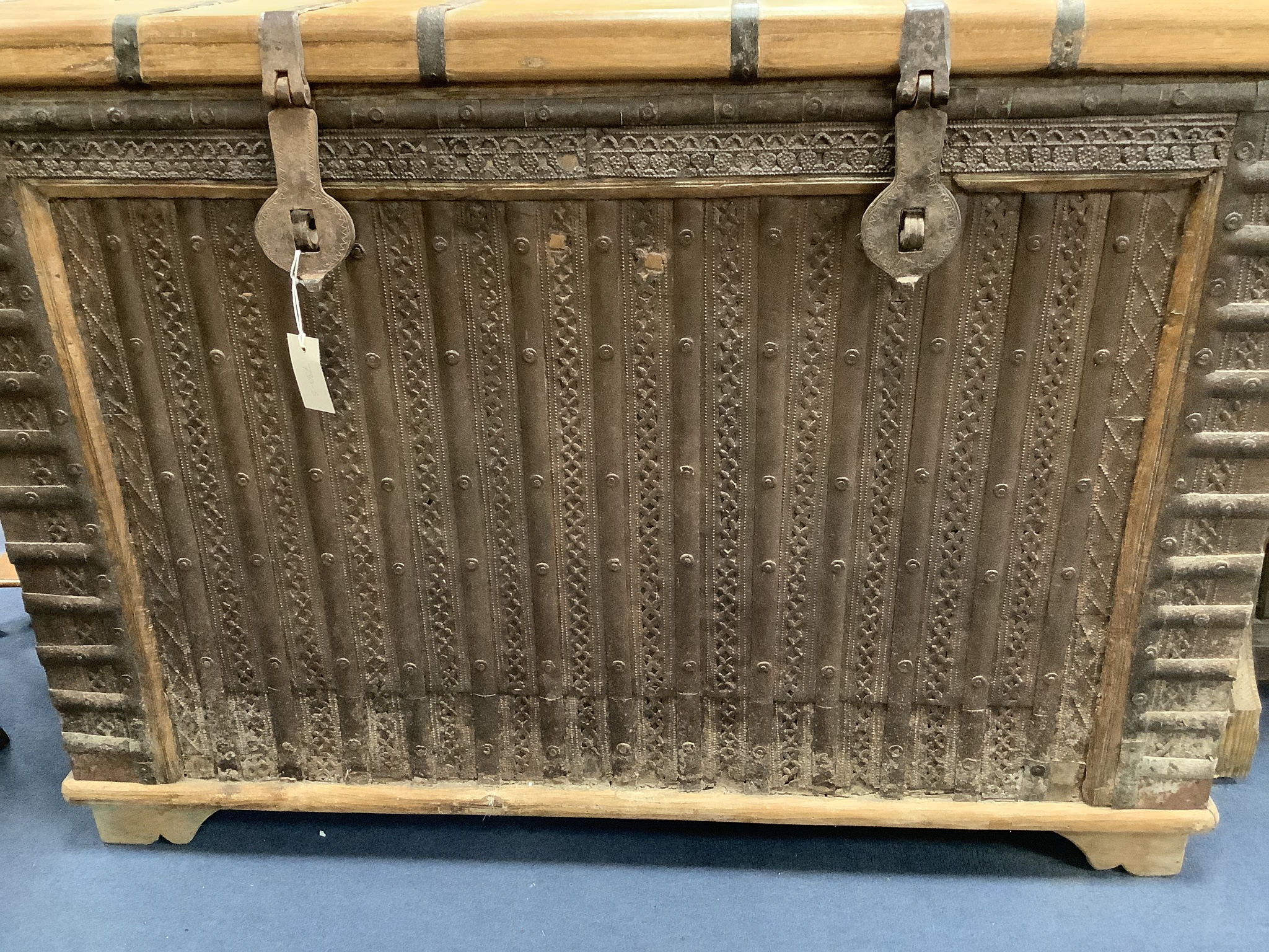 An Indonesian iron bound hardwood trunk, length 122cm, depth 54cm, height 86cm
